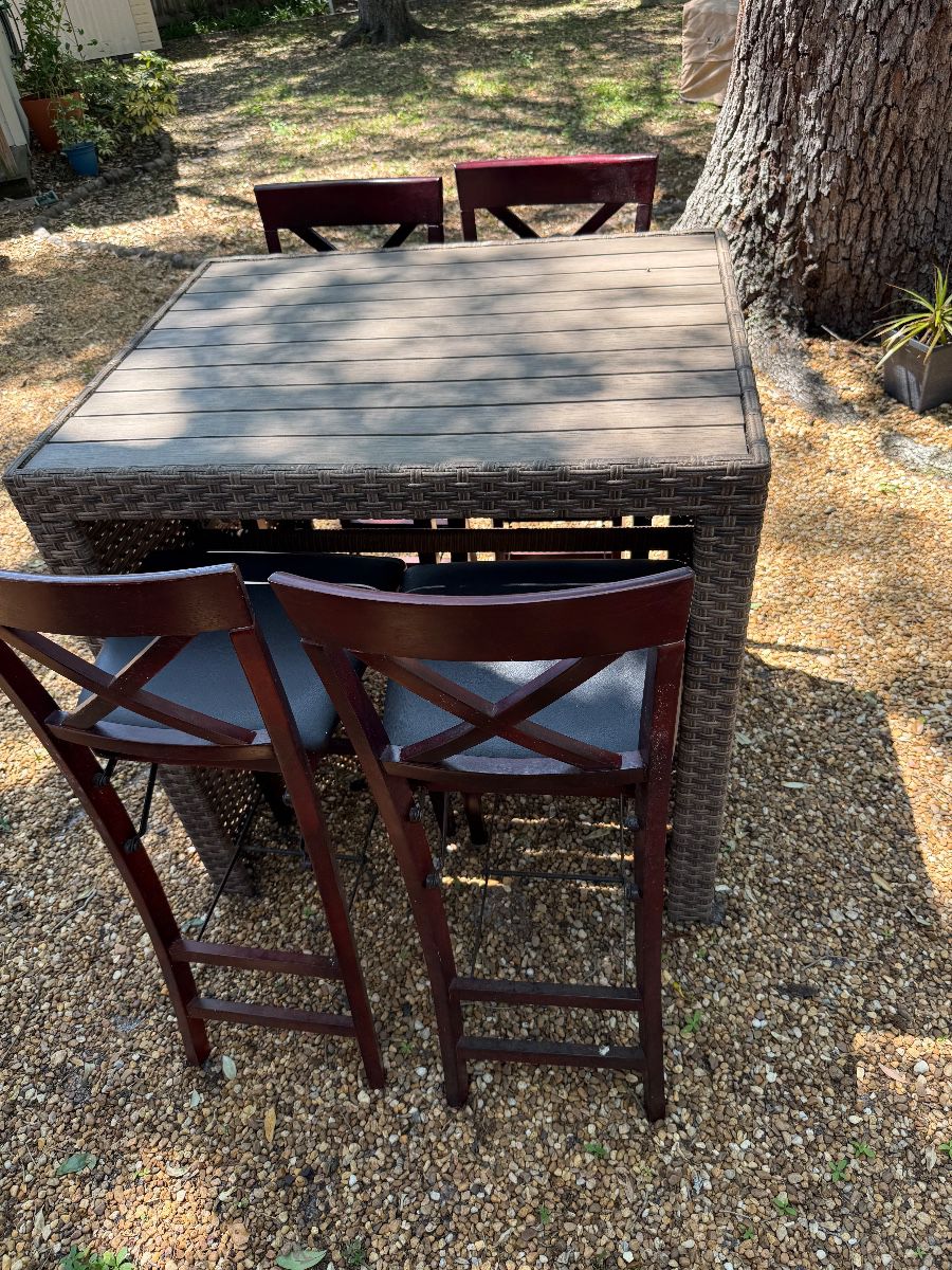 All-Weather Wicker Outdoor Dining Set with Four Bar Stools