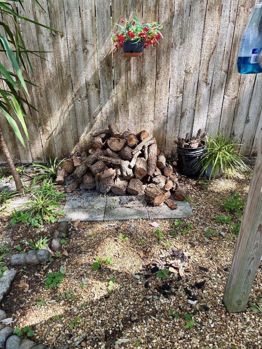 Firewood and Decorative Garden Accents Grouping