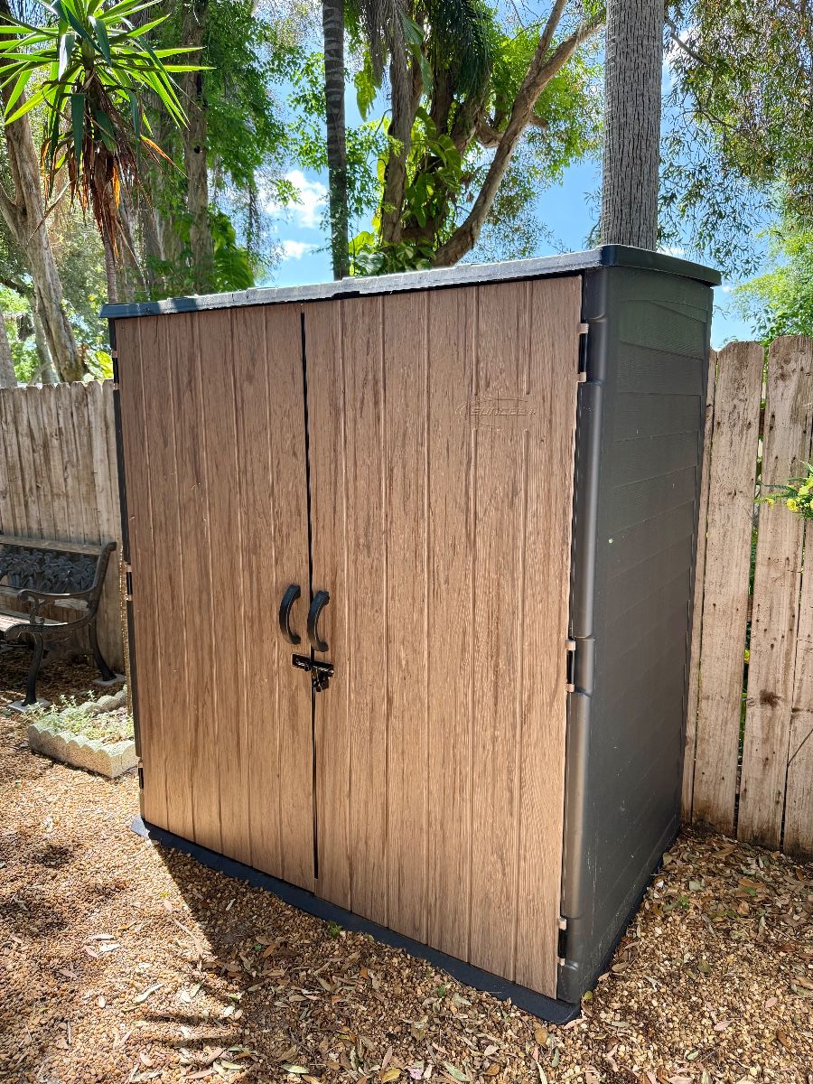 Suncast Resin Storage Shed with Wood-Look Doors