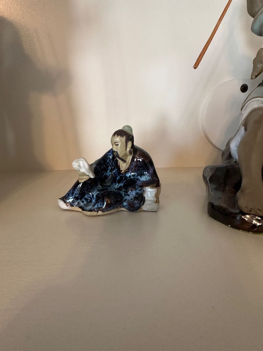 Japanese Ceramic Seated Man Figurine