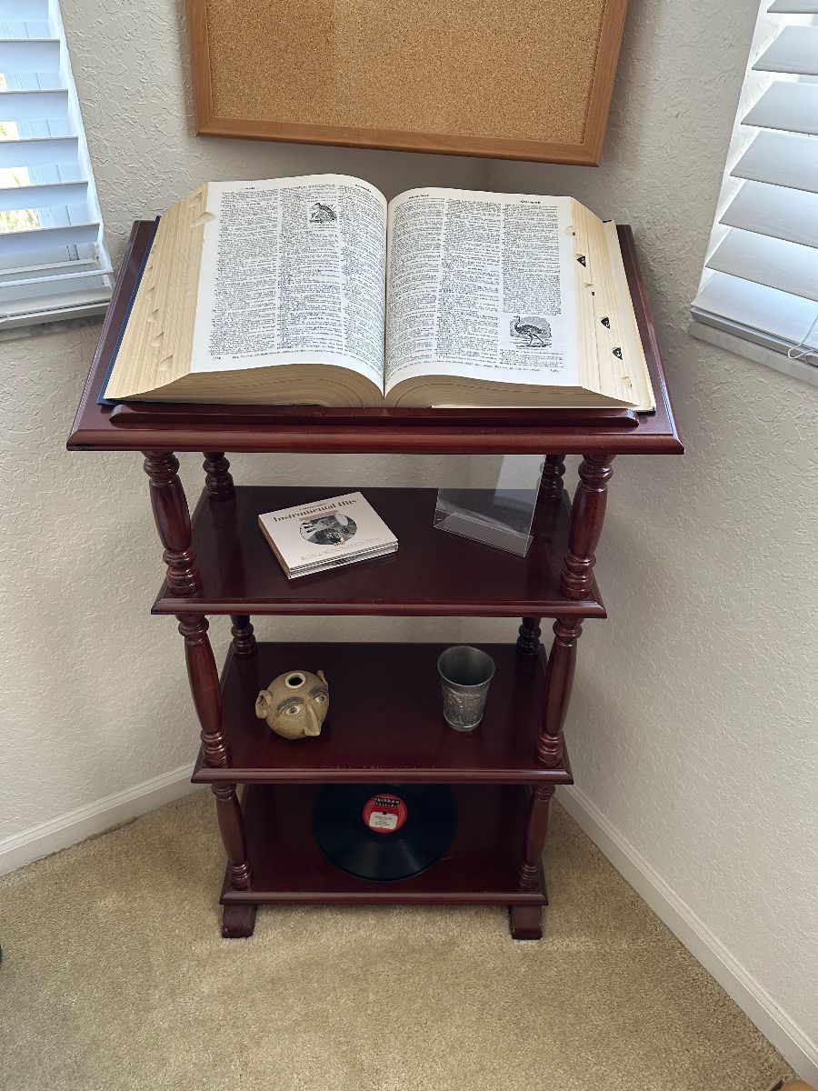 Vintage Accent Table with Assorted Decorative Items
