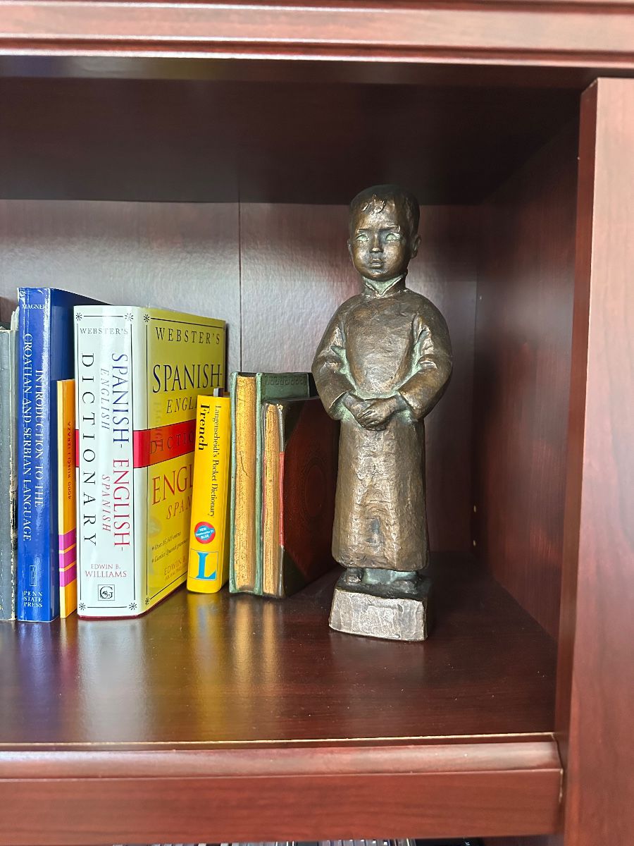 Vintage Bronze Child Sculpture with Reference Books