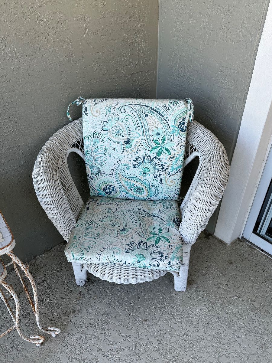 White Wicker Armchair with Paisley Cushions