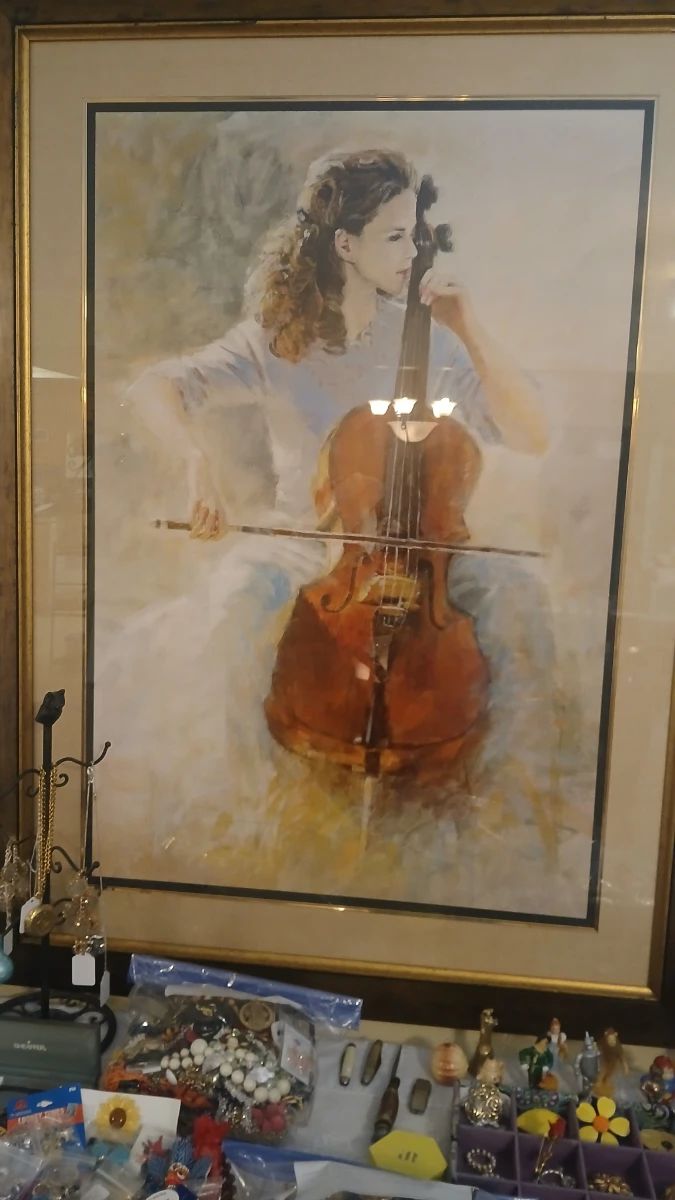 Framed Art Print of Cellist