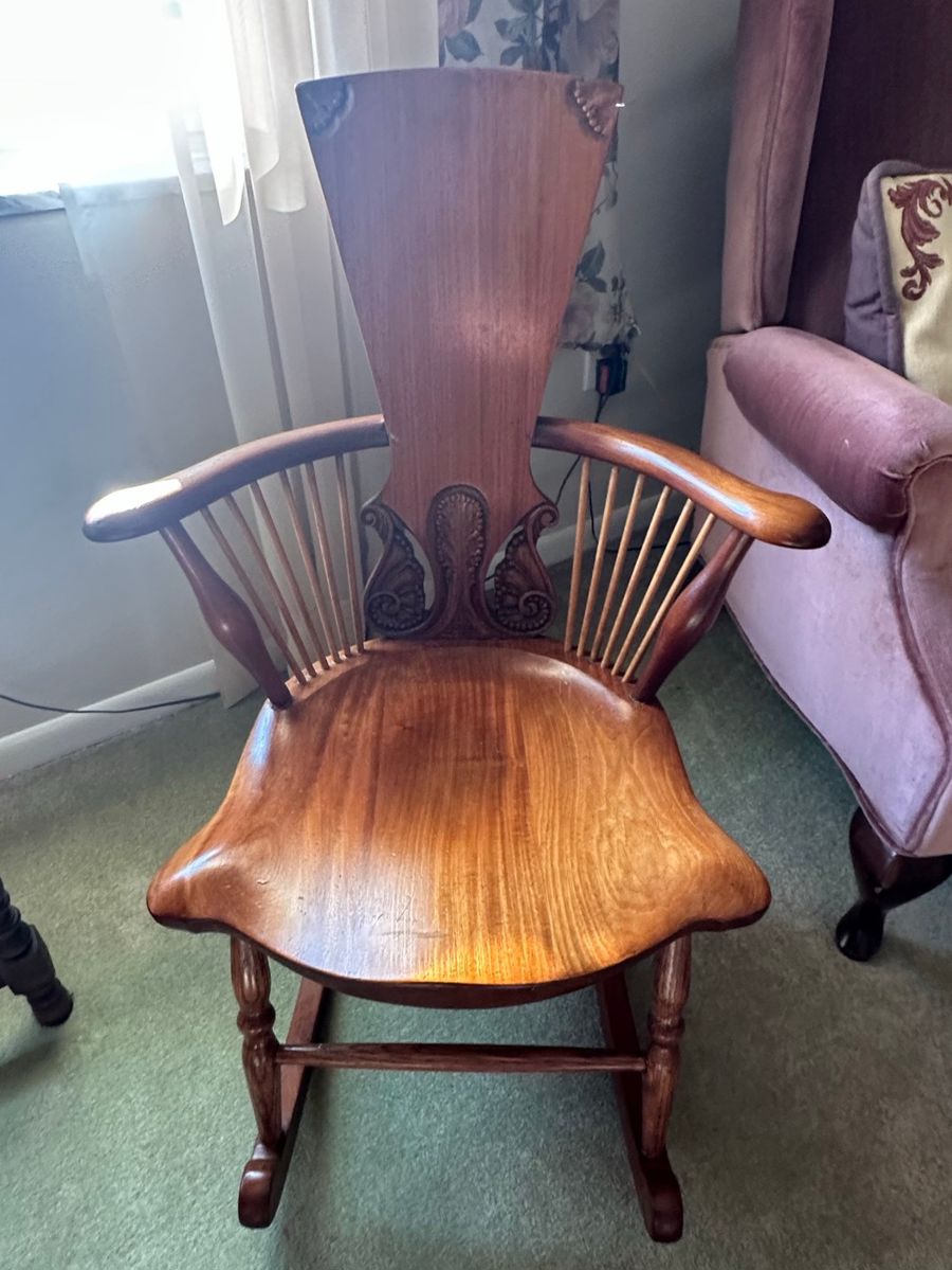 Slipper Seat Spindle Back Rocker with Carved Crest Rail