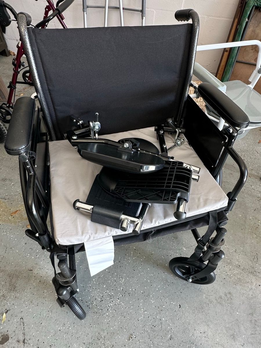 Lightweight Transport Wheelchair with Detachable Footrests