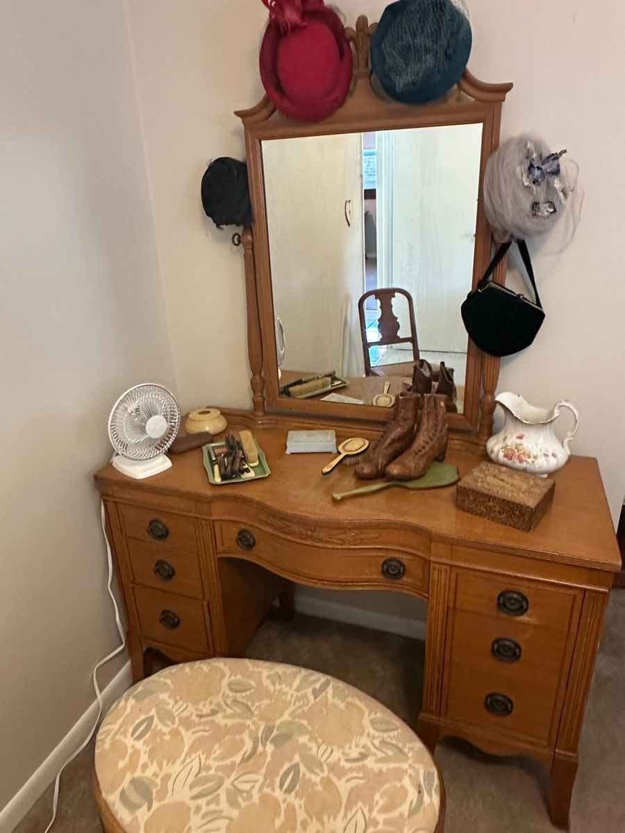 Vintage Vanity Assortment with Hats, Boots, and Accessories