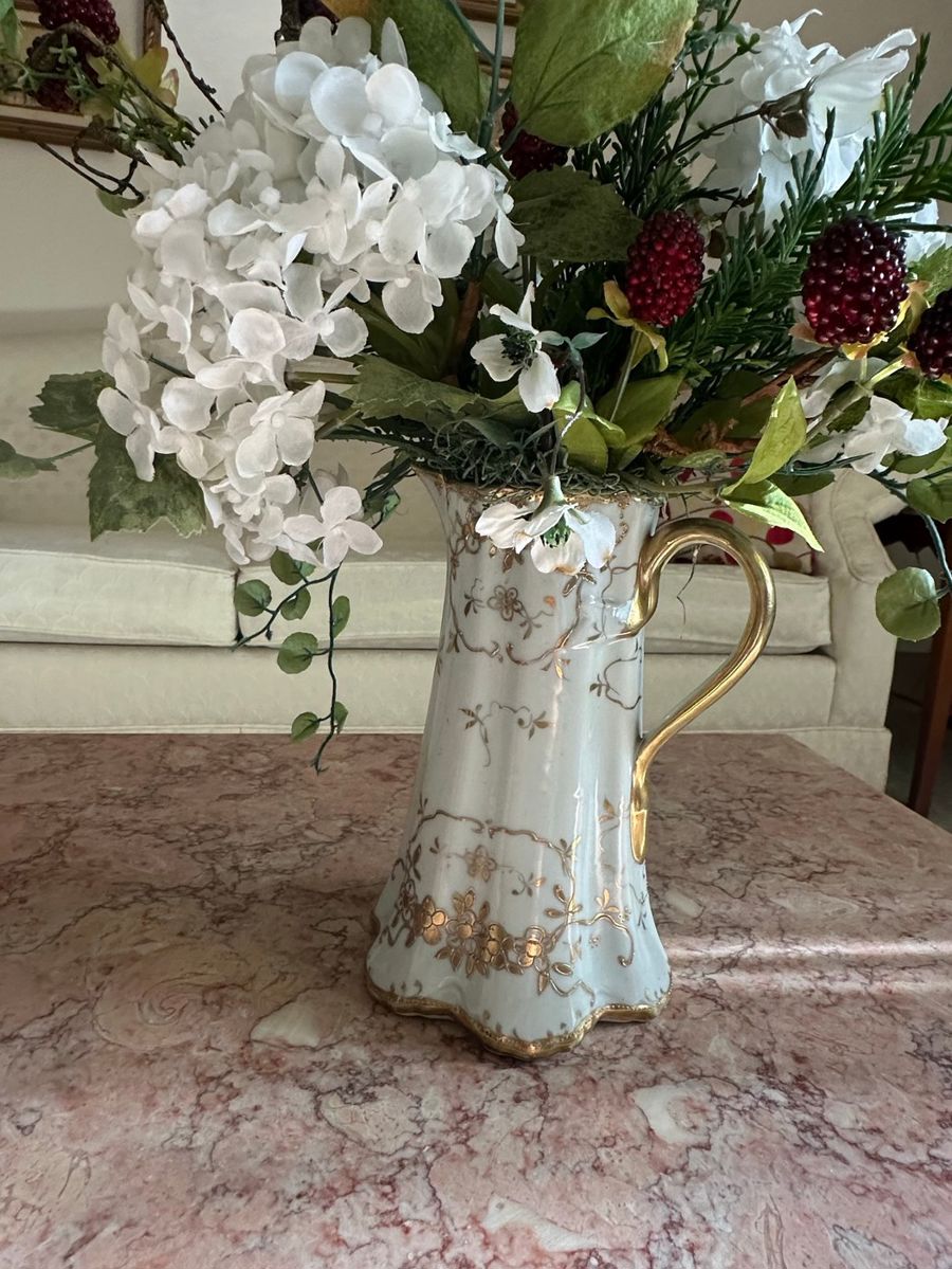 Ornate Porcelain Pitcher with Gilded Floral Accents