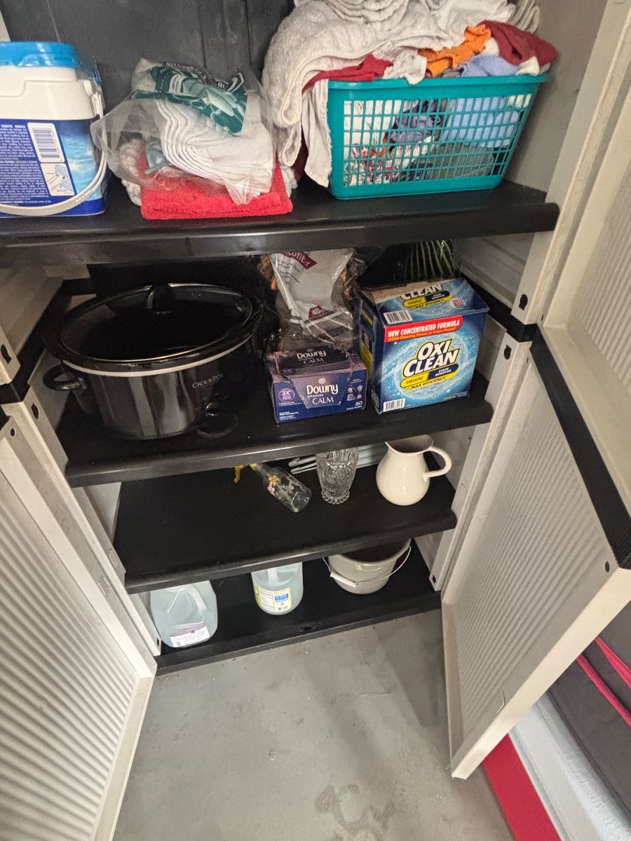 Storage Cabinet Lot: Linens, Cleaning Supplies & Kitchenware
