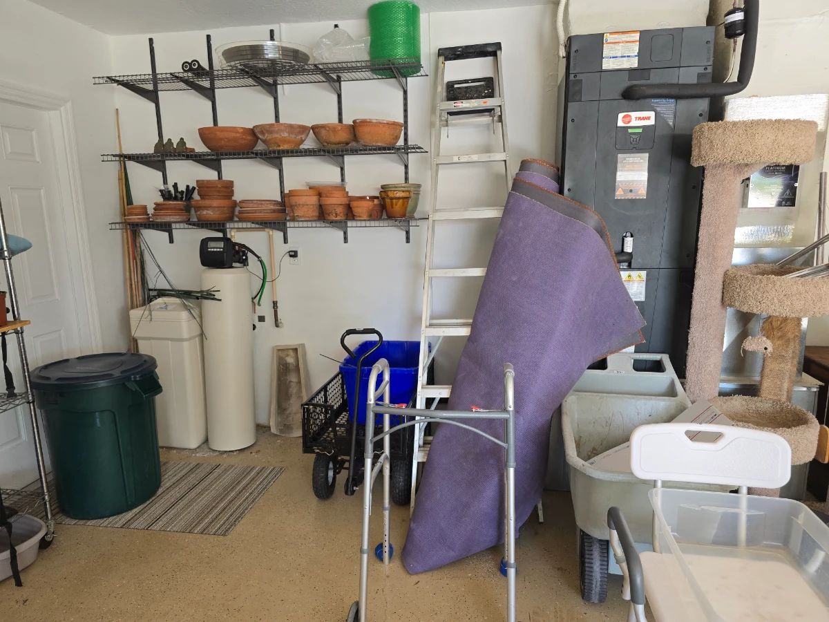 Garage Storage Assortment with Gardening Supplies, Cat Tree, and Mobility Aid