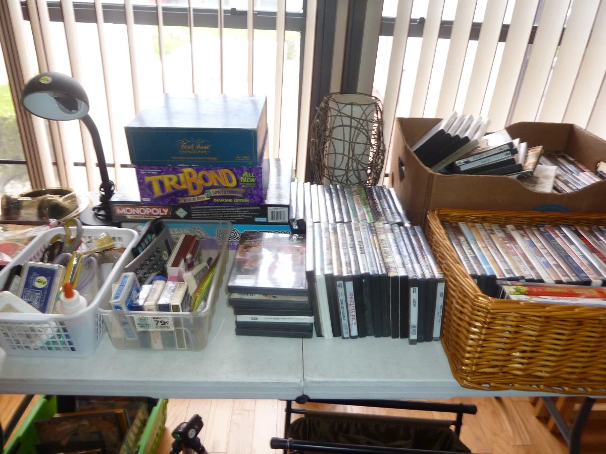 Assorted DVDs and Board Games