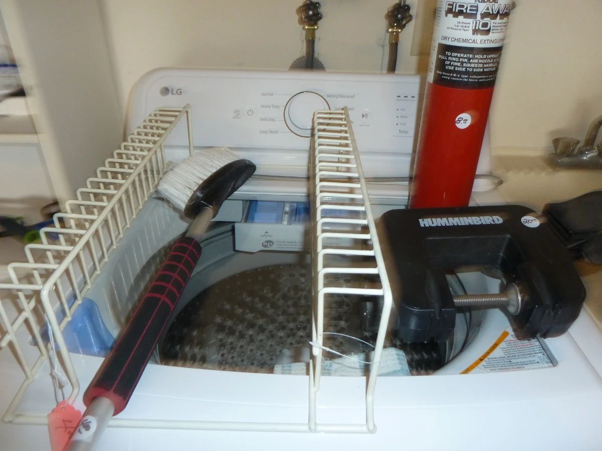 LG Washing Machine With Assorted Household Items