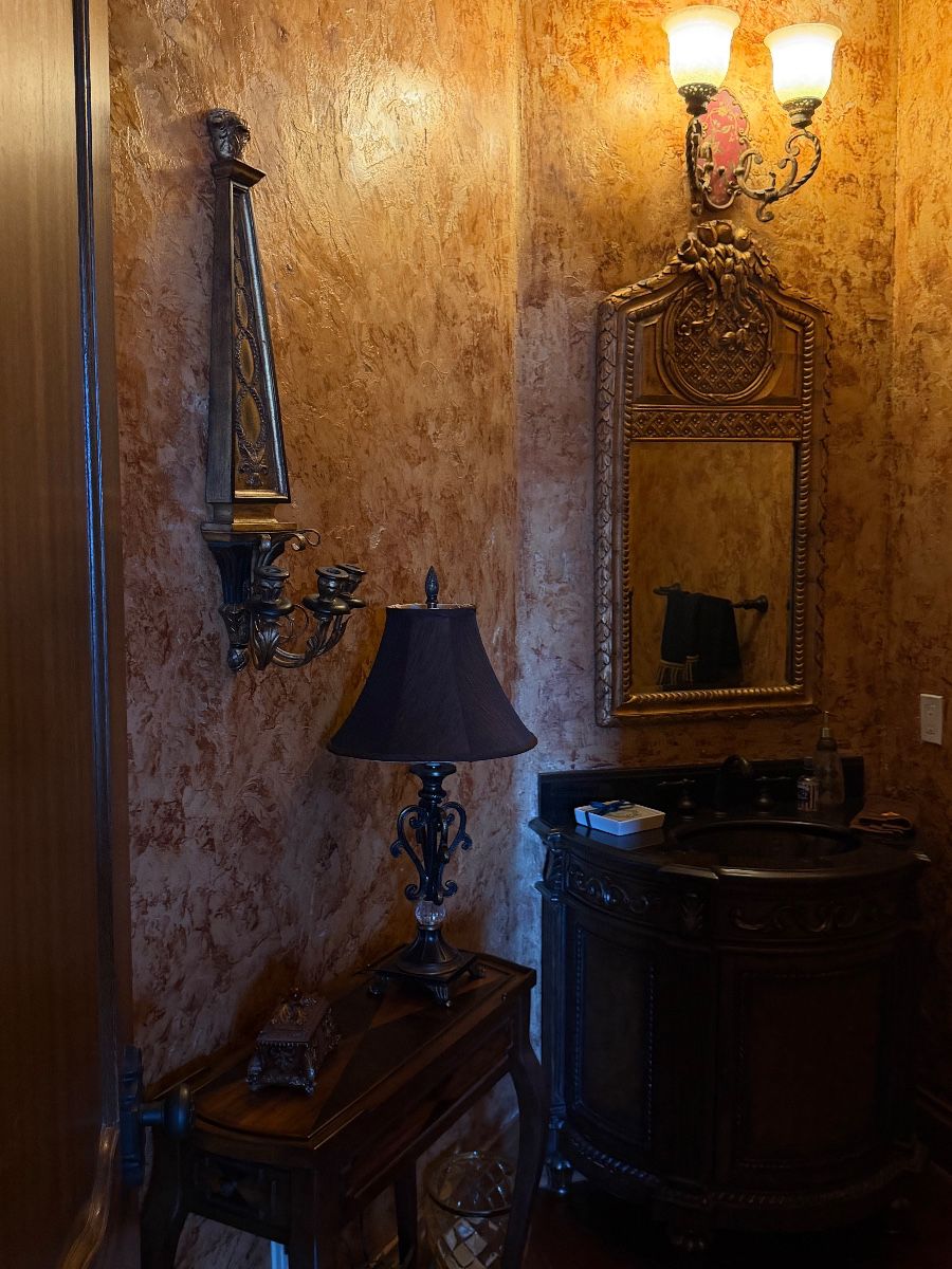 Luxury Vanity Set with Ornate Mirror, Wall Sconce, and Table Lamp