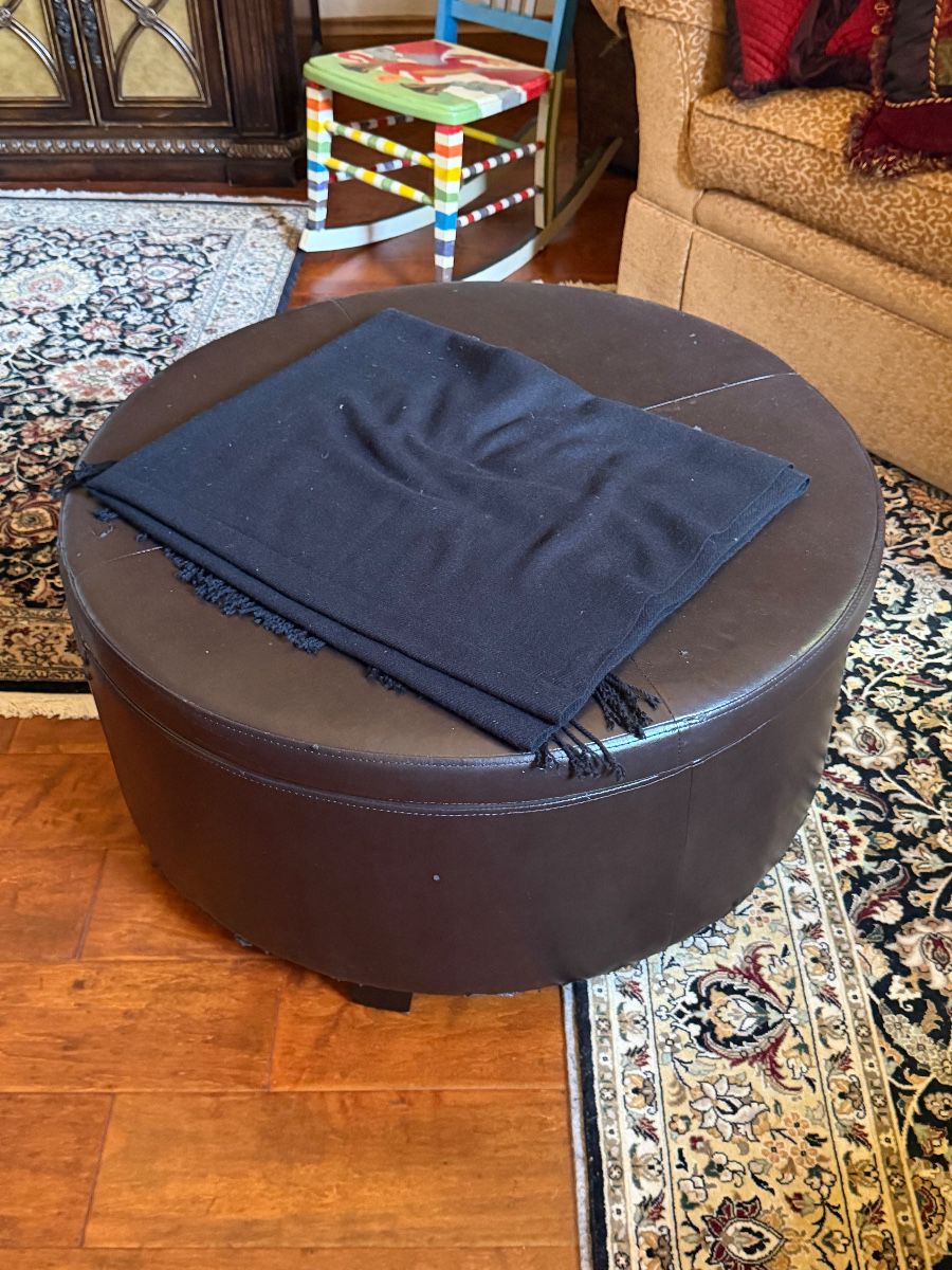 Brown Leather Storage Ottoman with Throw Blanket