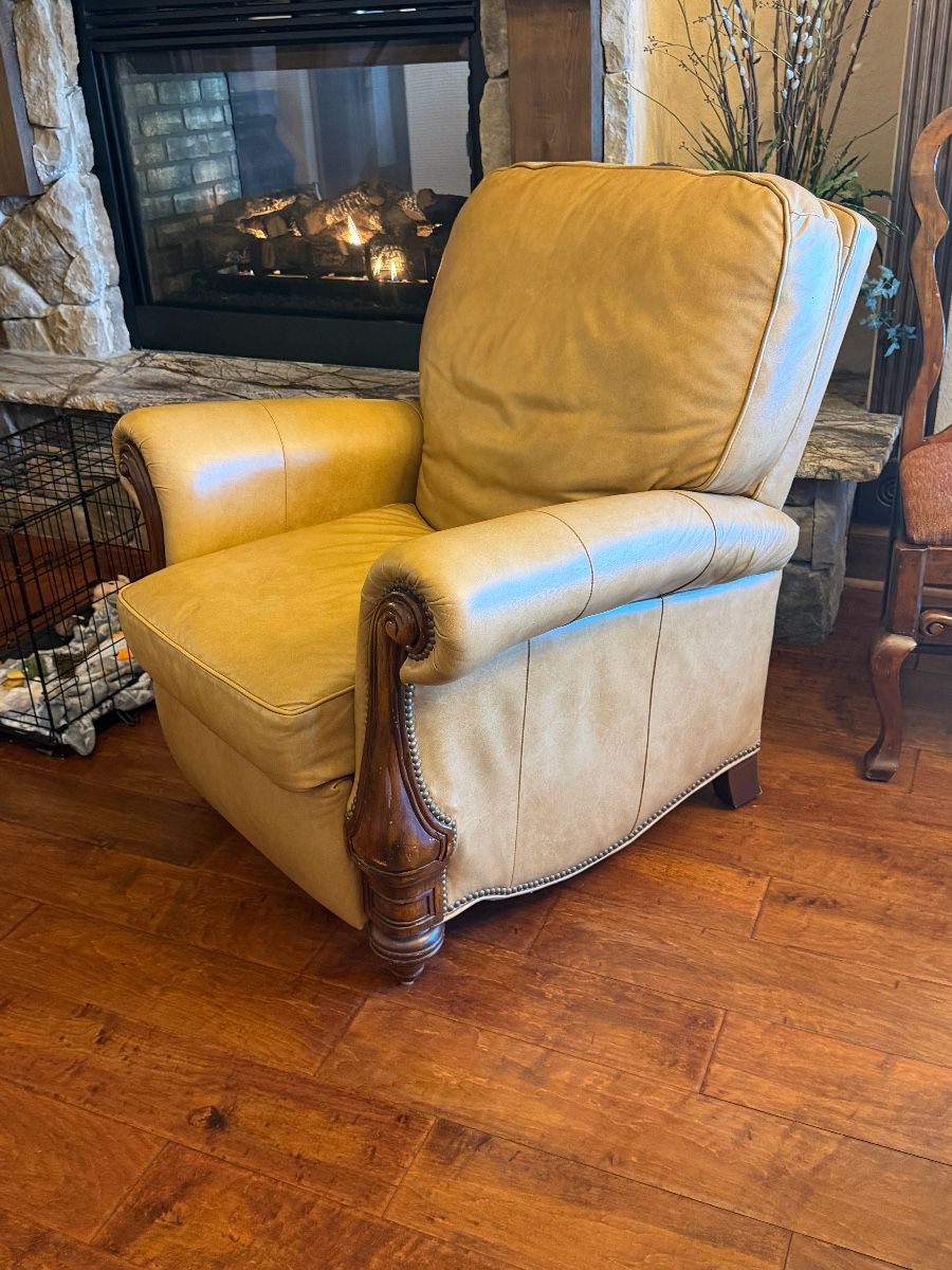 Tan Leather Upholstered Armchair with Carved Wood Trim