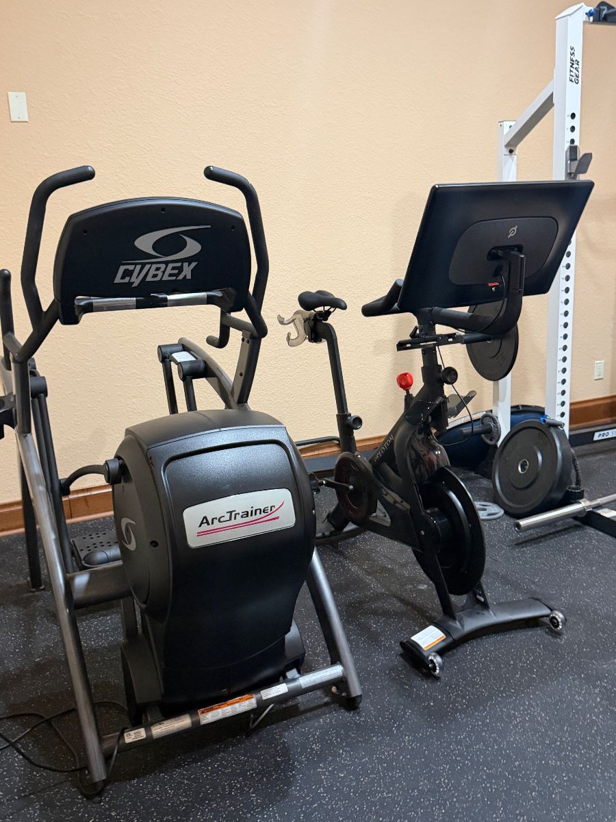 Cybex ArcTrainer Elliptical and Peloton Bike+ Cycle Home Gym Equipment
