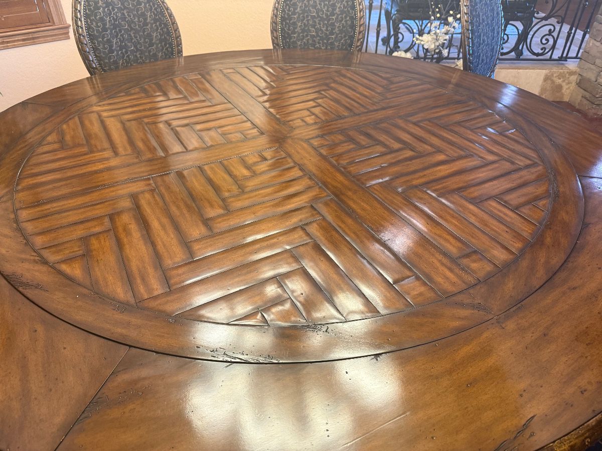 Round Dining Table with Parquet Inlay and Upholstered Chairs