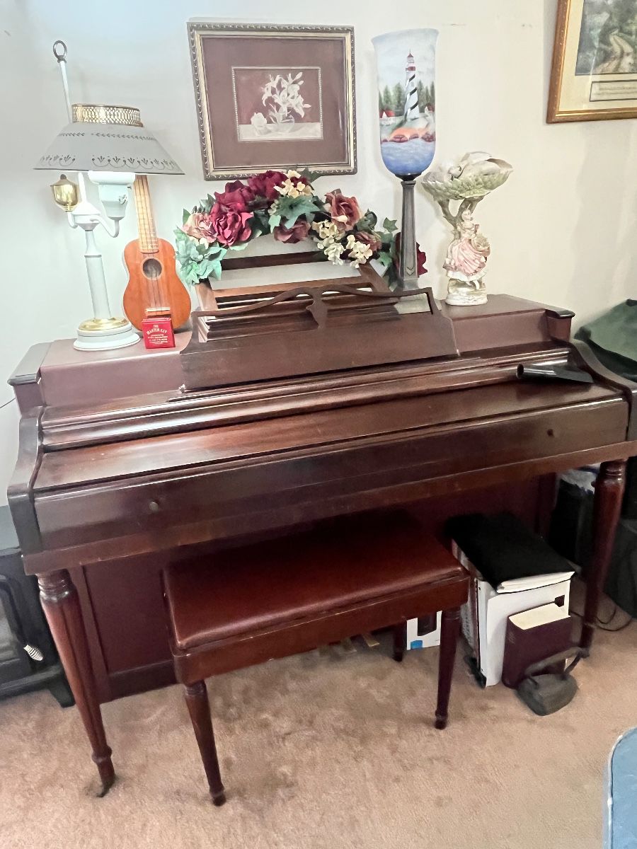 Antique Upright Piano with Bench and Decorative Accessories