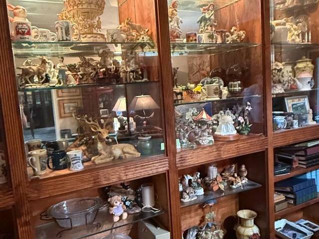 Items on offer in Lutz, FL — Rack 'Em Up on 2.85 Acres: Brunswick Pool Table, a Working Grandfather Clock & a Barn to Explore